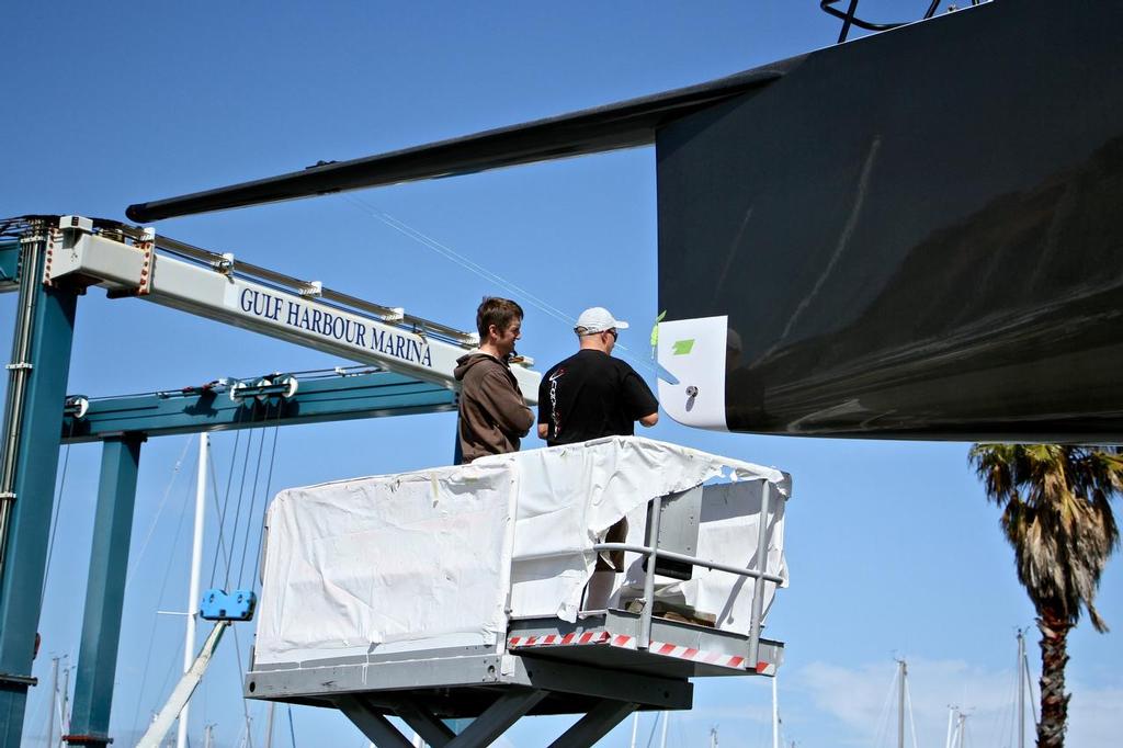 Fitting the fore strut stay - Rio - Gulf Harbour September 5, 2014 © Richard Gladwell www.photosport.co.nz